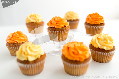 Image of cupcakes with frosting on white background