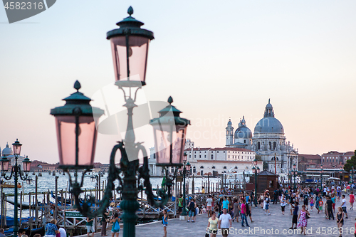 Image of VENICE, ITALY - AUGUST 23, 2012. Cityscape with view to Basilica Santa Maria della Salute and Grand Canal.