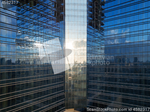 Image of Reflection on a glass facade of office building