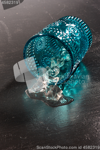 Image of Ovetuned vintage glass with melting ice.