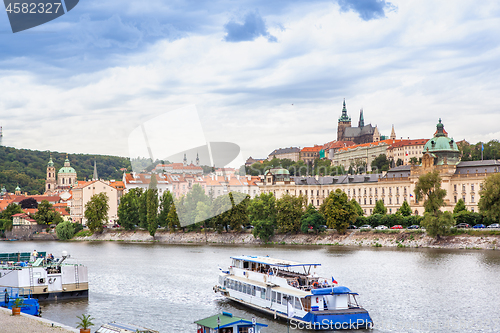 Image of Passenger boat on the cityscape Prague background.