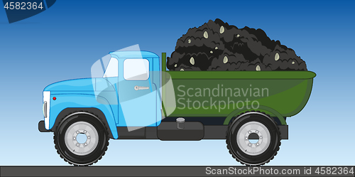 Image of Vector illustration of the cargo car with soil in basket