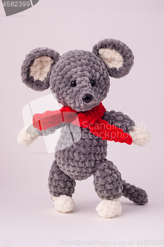 Image of Funny knitted teddy mouse, white background