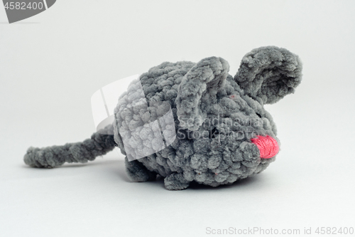 Image of Grey knitted mouse on a white background