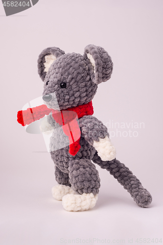 Image of Funny knitted teddy mouse, Side view, white background