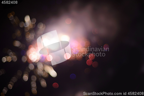 Image of Defocused firework lights. Can be used as background