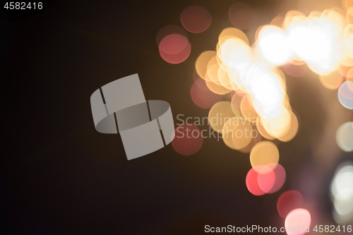 Image of Defocused festive lights. Can be used as background