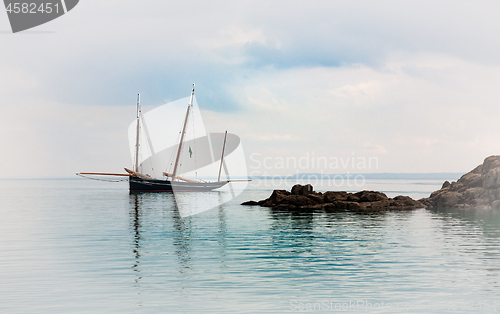 Image of Sailing boat in the clear water