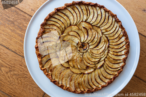 Image of Traditional french apple tart over wood