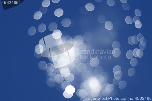 Image of Defocused festive lights. Can be used as background