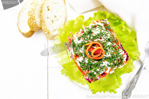 Image of Salad with beef and vegetables on light board top