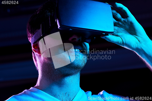 Image of man in virtual reality headset or vr glasses