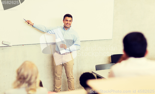 Image of group of students and teacher on lecture