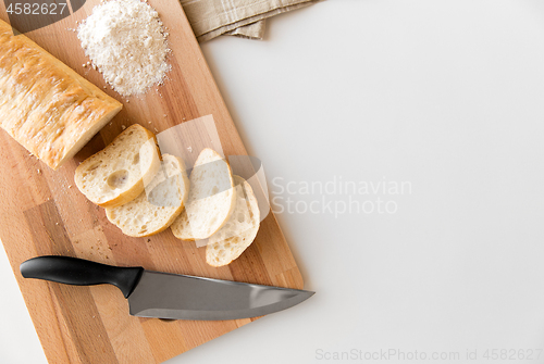 Image of close up of white ciabatta bread on cutting board