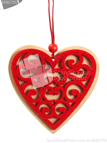 Image of Red wooden heart on white