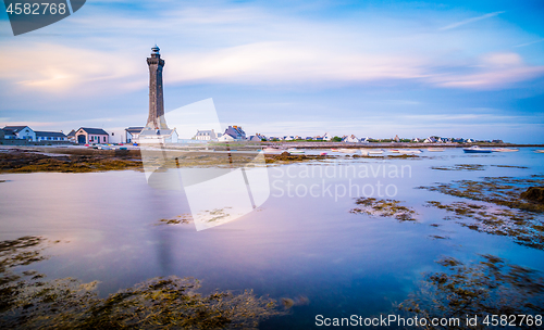 Image of Eckmuhl lighthouse in Brittany against blue