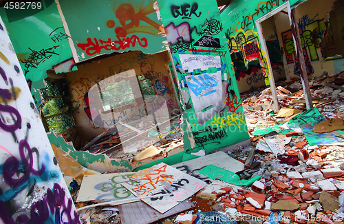 Image of Abandoned building destroyed with graffiti walls