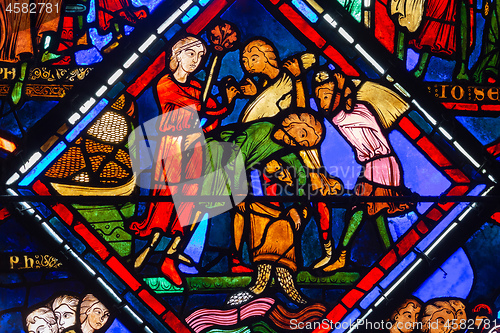 Image of Bourges cathedral stained glass, Joseph orders grain to be poure