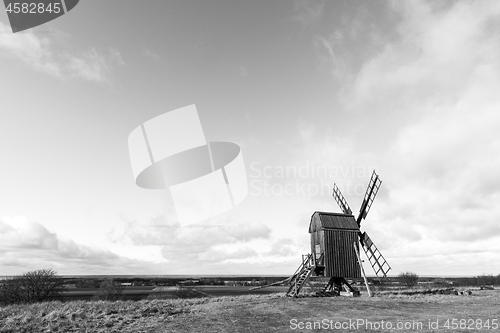 Image of Open landscape with an old windmill in BW