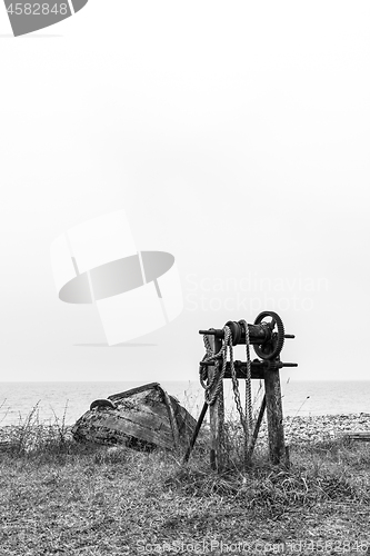 Image of Old boat and winch in black and white