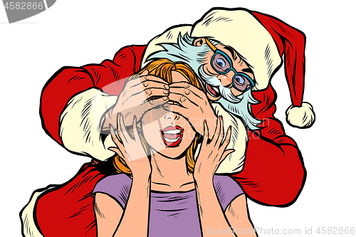 Image of surprise gift Santa Claus character, Christmas and New year