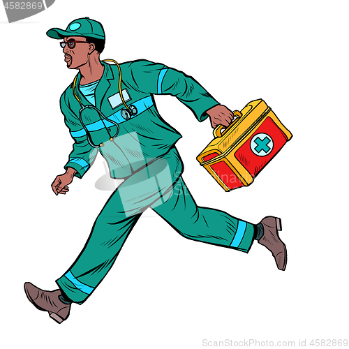 Image of African ambulance doctor. Male medic with first aid kit