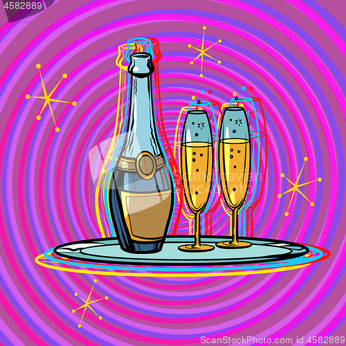 Image of A bottle of champagne with glasses on a tray. Celebration