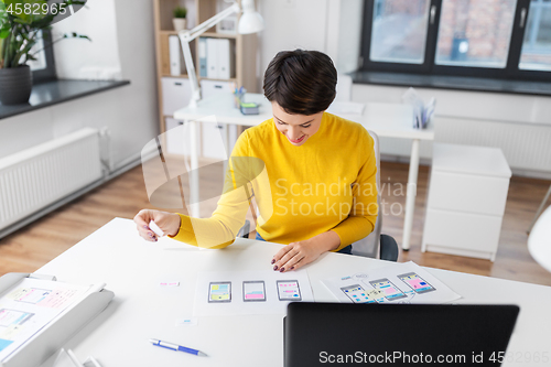 Image of ui designer working on user interface at office