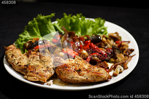 Image of pan fried chicken with roasted vegetables