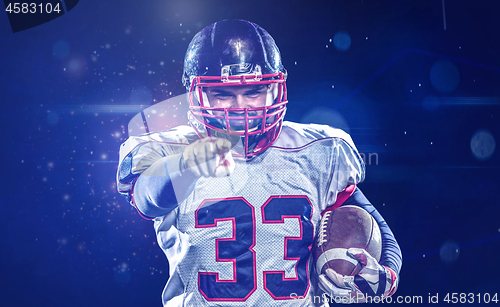 Image of portrait of confident American football player