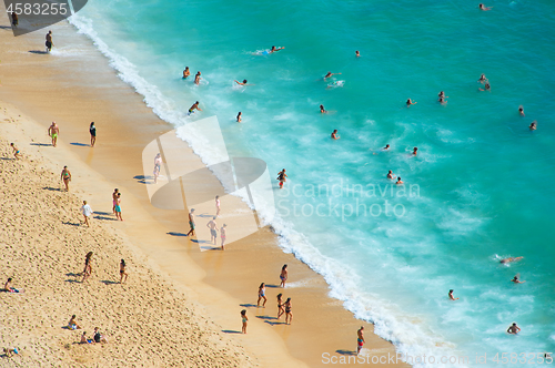 Image of Crowded ocean beach. Aerial view