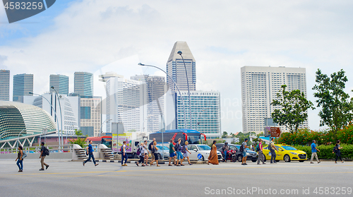 Image of People crossing the road. Singapore