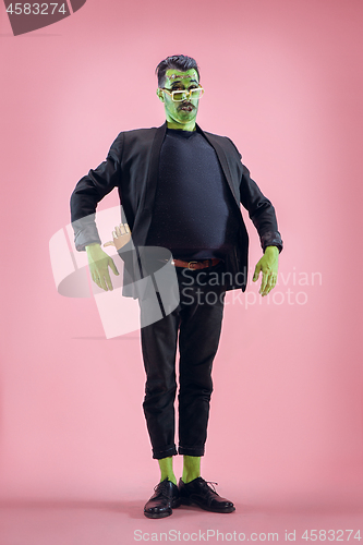 Image of Bloody Halloween theme: The crazy maniak face on studio background