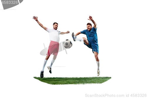 Image of Football players tackling for the ball over white background