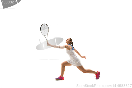 Image of Adult woman playing tennis. Studio shot over white.