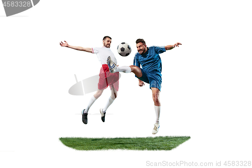 Image of Football players tackling for the ball over white background