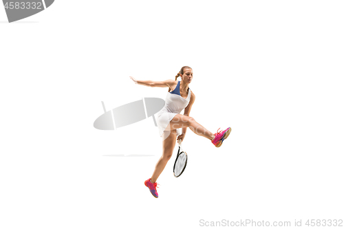 Image of Adult woman playing tennis. Studio shot over white.