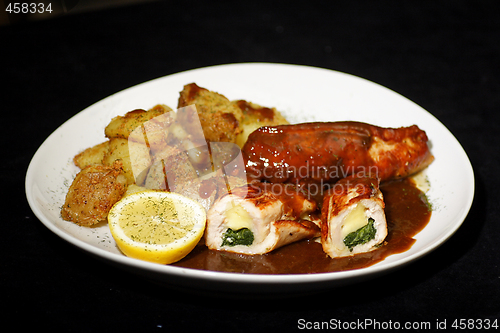 Image of stuffed turkey with red wine sauce