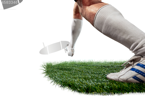 Image of Football player tackling for the ball over white background