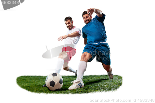 Image of Football players tackling for the ball over white background