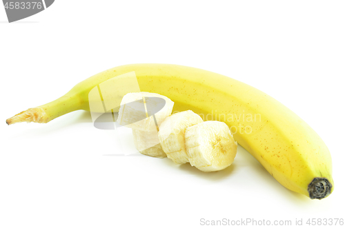 Image of Ripe yellow banana with sliced bananas