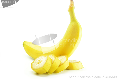 Image of Ripe yellow banana with sliced bananas
