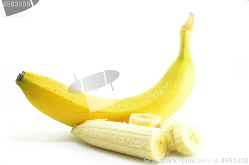 Image of Ripe yellow banana with sliced bananas