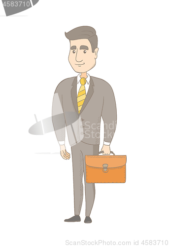 Image of Young caucasian businessman holding briefcase.