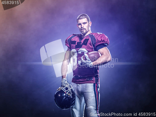 Image of portrait of confident American football players