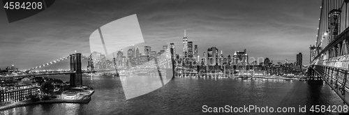 Image of Brooklyn Bridge and Lower Manhattan skyline at night, New York city, USA.