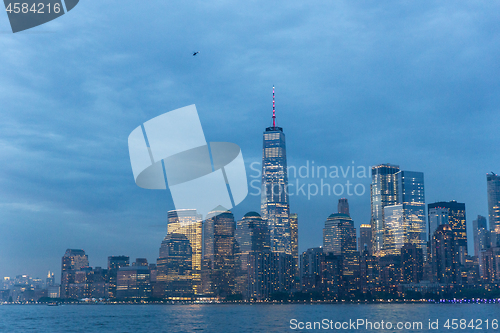 Image of Panoramic view of Lower Manhattan from Ellis Island at dusk, New York City.