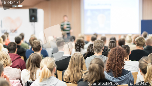 Image of Speaker giving presentation in lecture hall at university