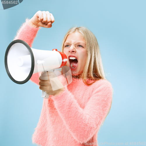 Image of The little girl making announcement with megaphone