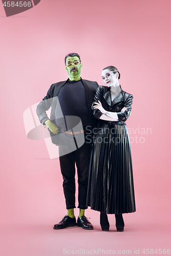 Image of Halloween Family. Happy couple in Halloween Costume and Makeup